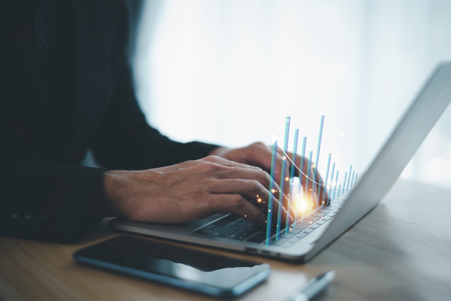 Image of working on a laptop